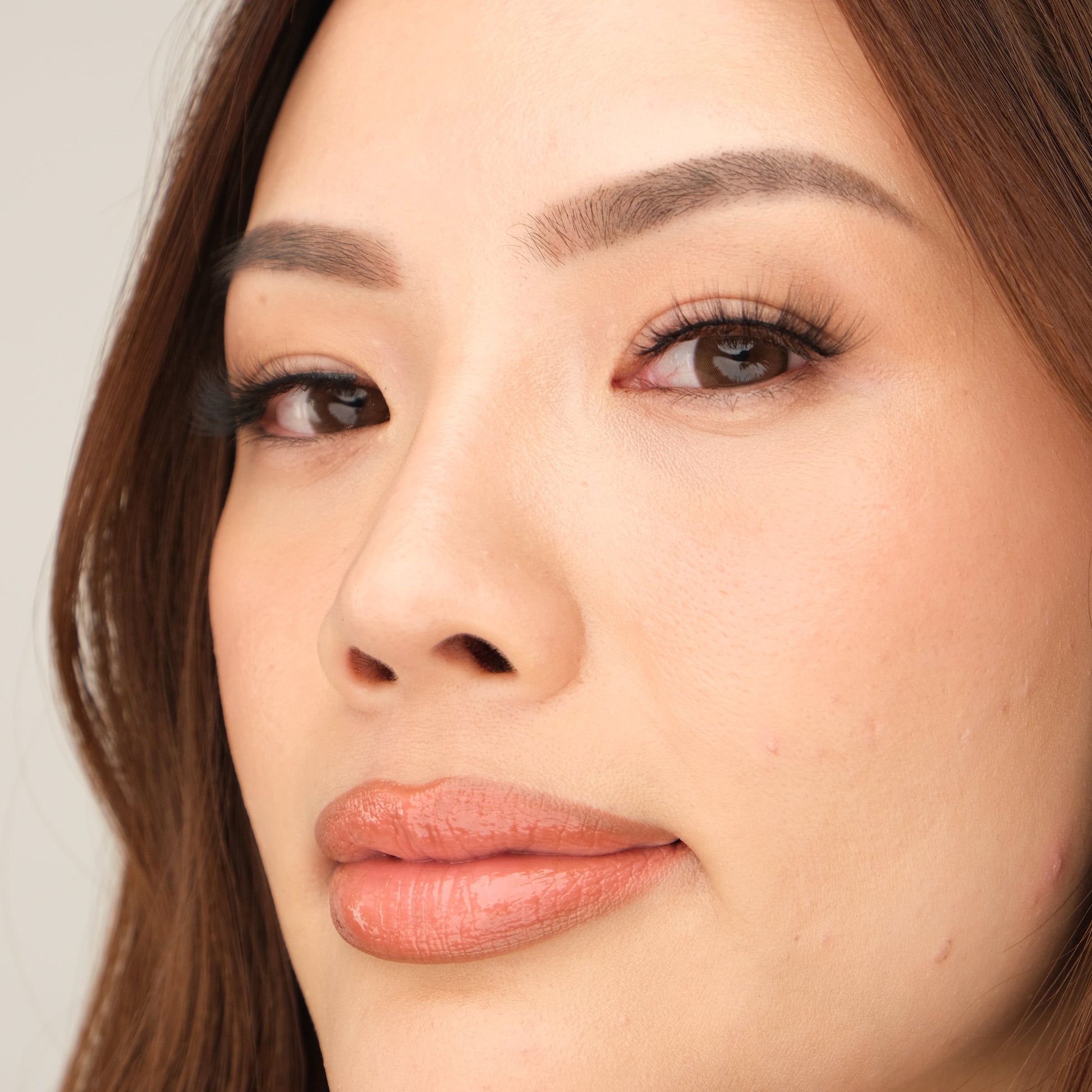 Side view of KISTU Celestial strip lash showing fluffy volume and curl