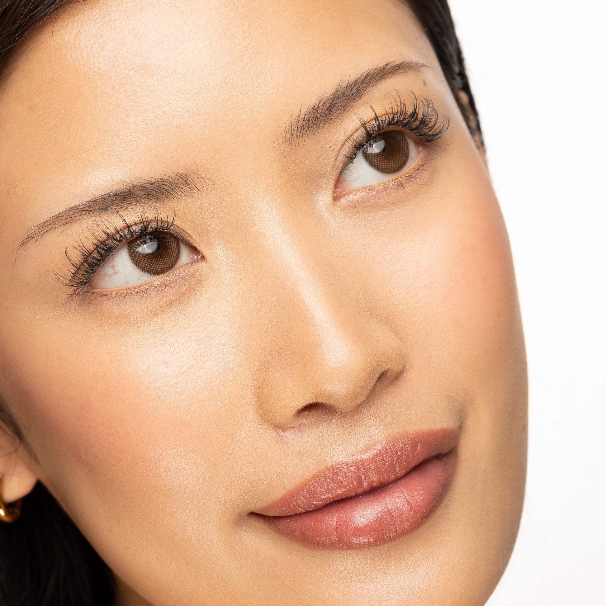Close-up of KISTU Halo cluster lashes showing fine lash fans